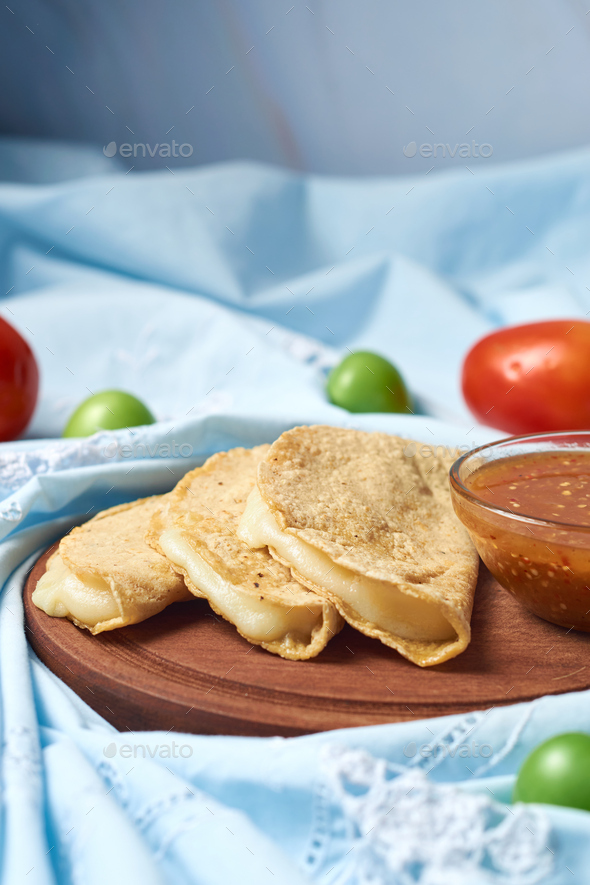 Authentic Mexican quesadillas made with corn tortillas filled with